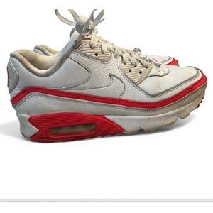 Nike Undefeated x Air Max 90 in a white and solar red colorway